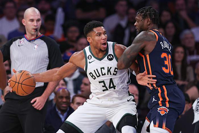 Milwaukee Bucks star Giannis Antetokounmpo defended by New York Knicks forward Julius Randle